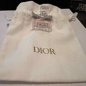 Miss Dior dabber perfume with Beauty pouch
